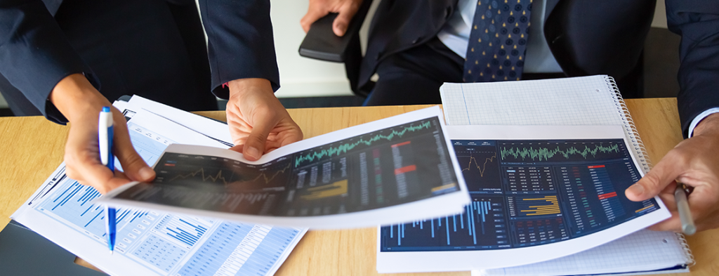investor-trader-discussing-statistic-data-holding-papers-with-financial-charts-pen-cropped-shot-broker